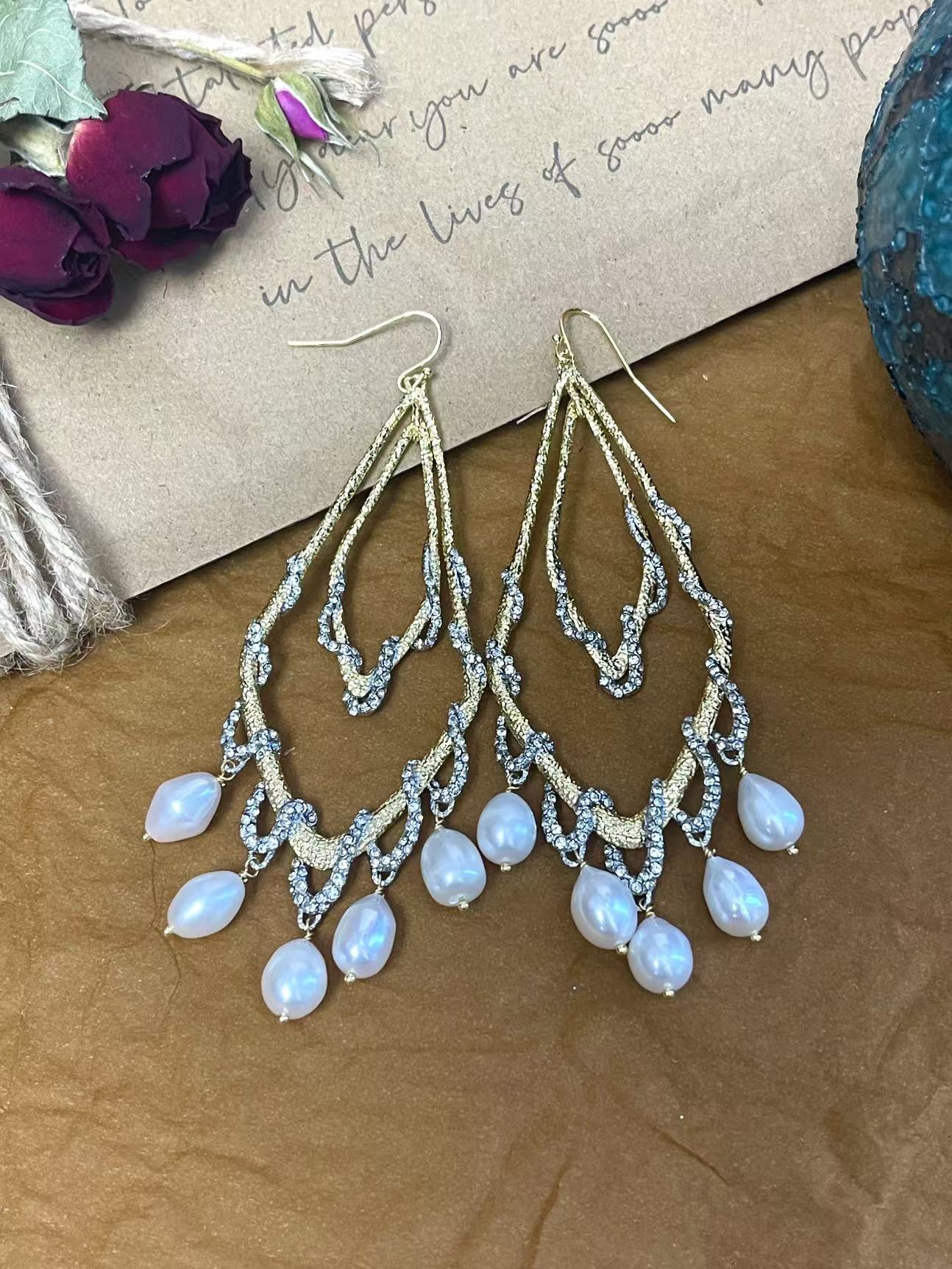 Artisan Statement Earrings: Baroque Pearl Fringe with Intricate Vine Motifs