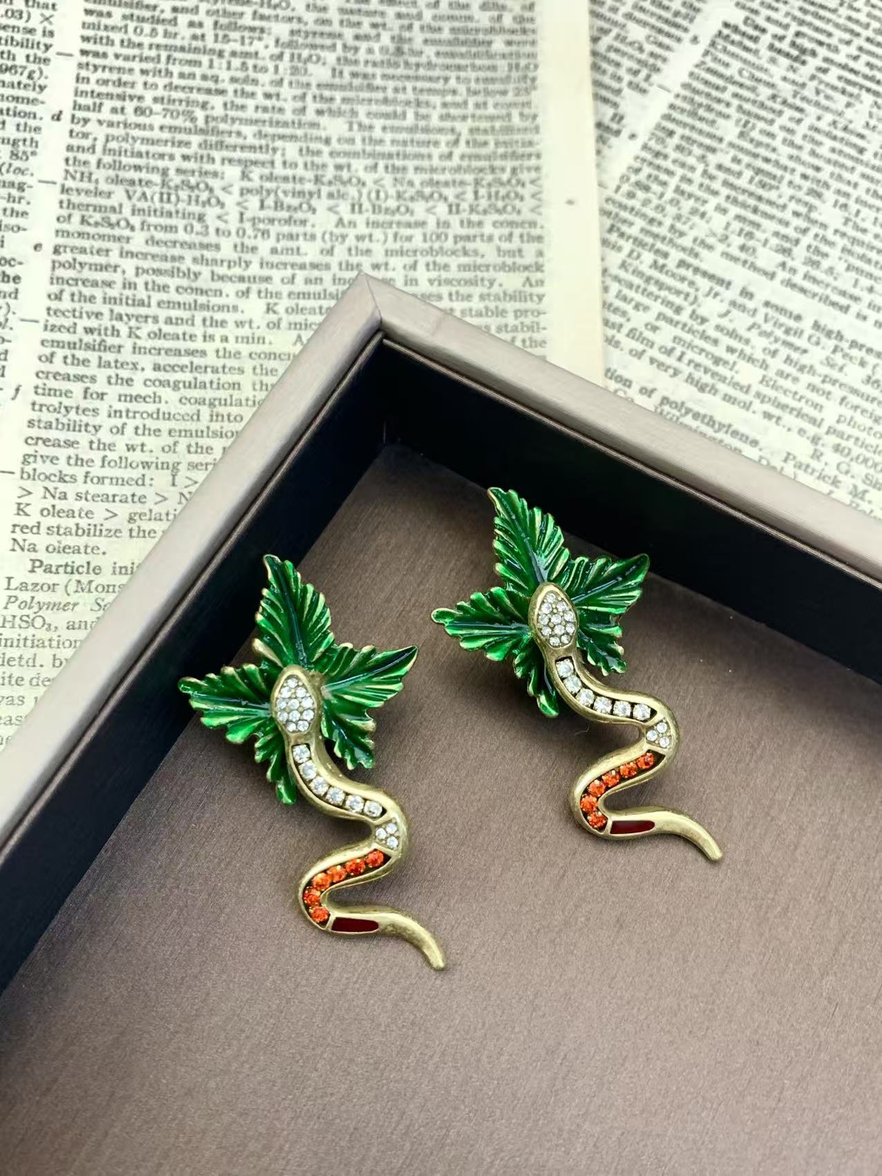 Artisan Brass Serpent Earrings: Vintage Statement Piece with Micro-Pave Crystal Detailing