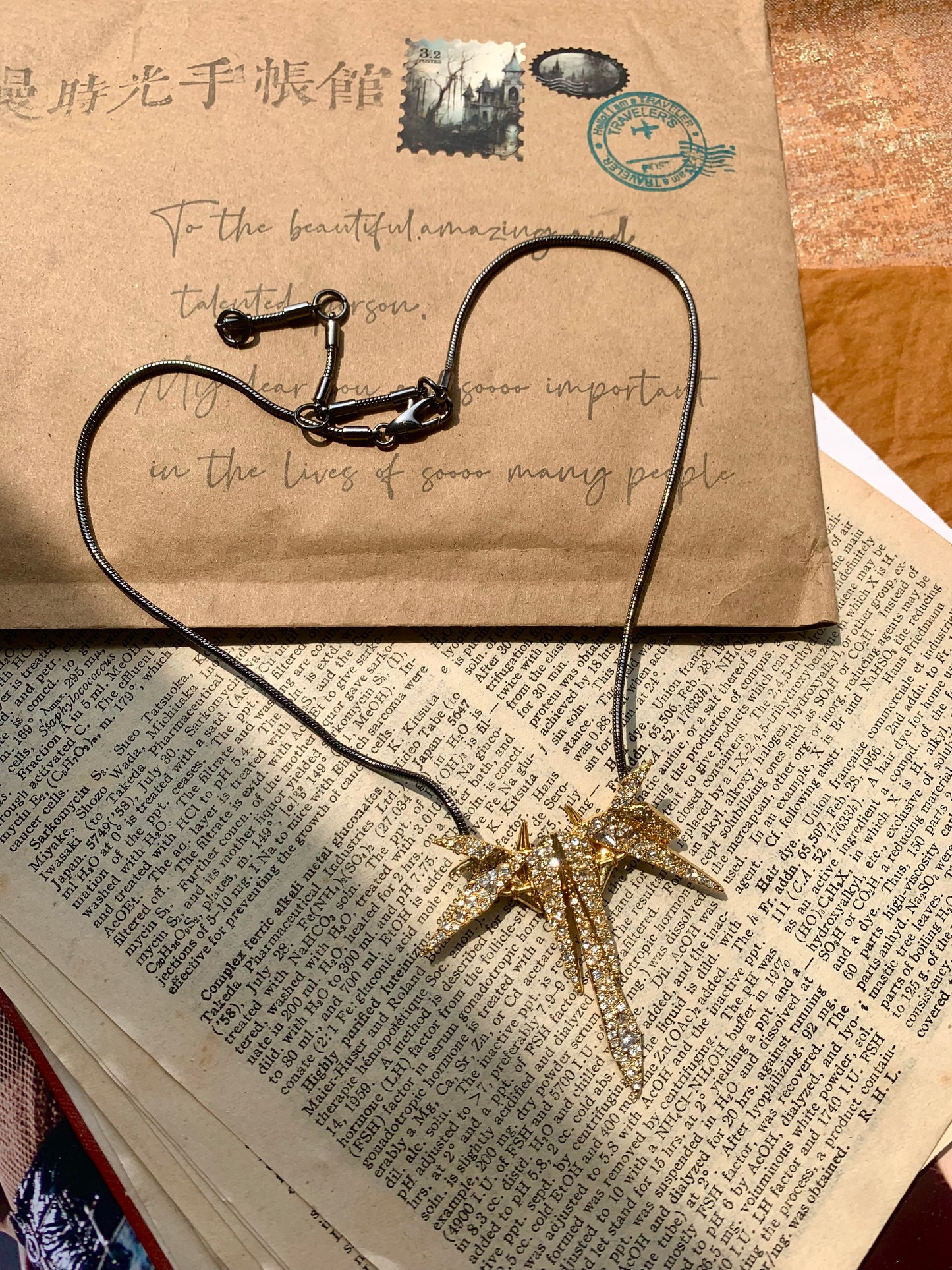 Avant-Garde Black Serpentine Chain with Gold Plated Full-Pave Leaf Motif Necklace