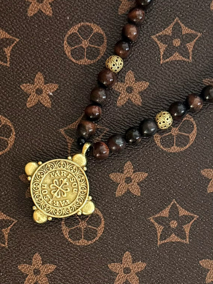 Vintage Tiger Eye Beaded Necklace with Brass Embossed Coin Pendant – Heavywork Indie Luxury Design