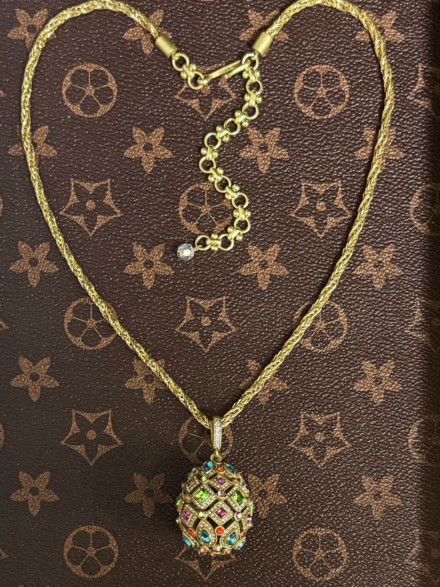 High-End Vintage Twisted Rope Chain Necklace with Hollow Enamel Egg Pendant – Gold-Plated Brass