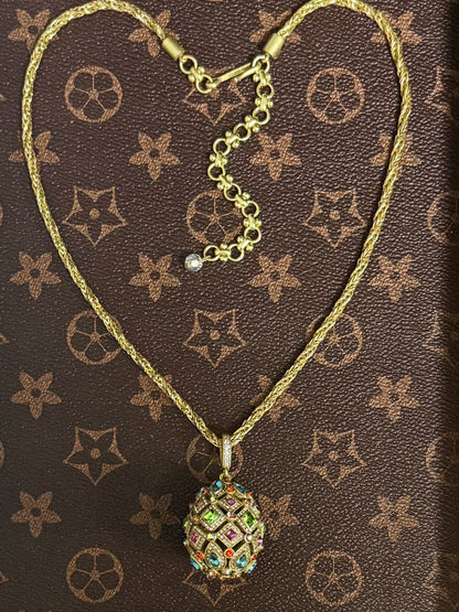 High-End Vintage Twisted Rope Chain Necklace with Hollow Enamel Egg Pendant – Gold-Plated Brass