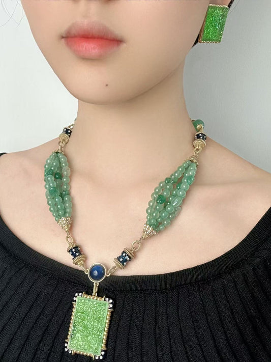 Royal-Inspired Necklace: Green Glass Beads with Enamel Pendant
