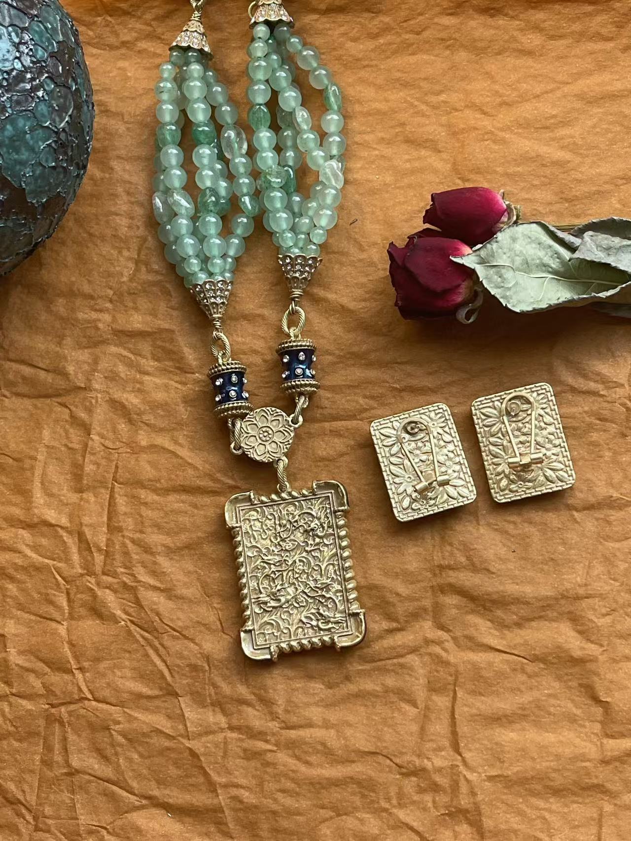 Royal-Inspired Necklace: Green Glass Beads with Enamel Pendant