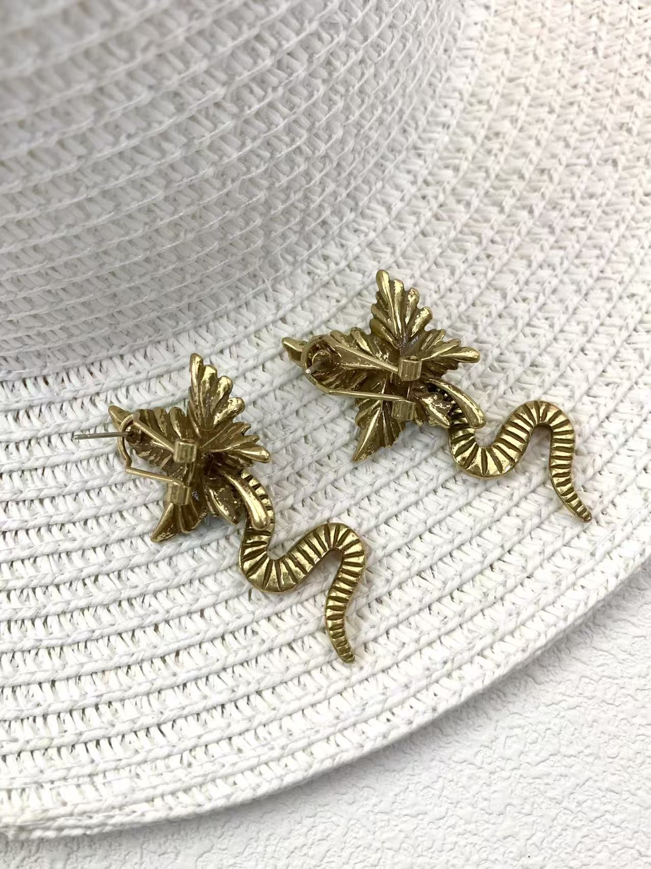 Artisan Brass Serpent Earrings: Vintage Statement Piece with Micro-Pave Crystal Detailing