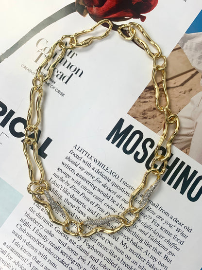 Avant-Garde Twist: Vintage Gold-Plated Copper Necklace with Micro-Pave Diamonds